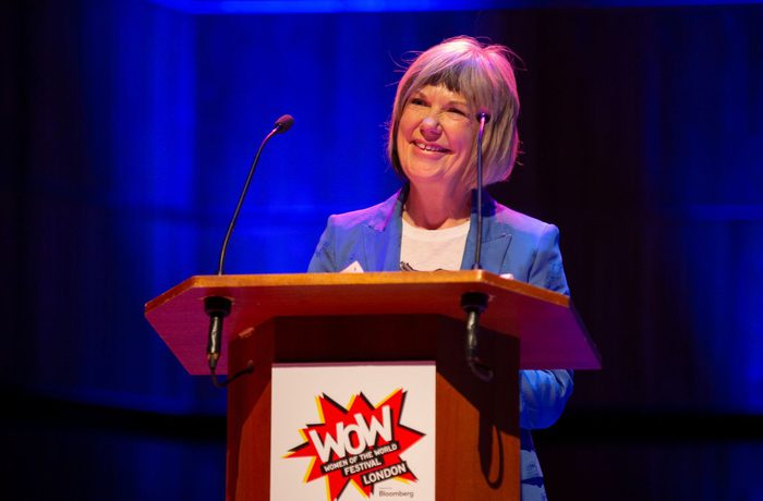 Jude Kelly stands behind a lectern